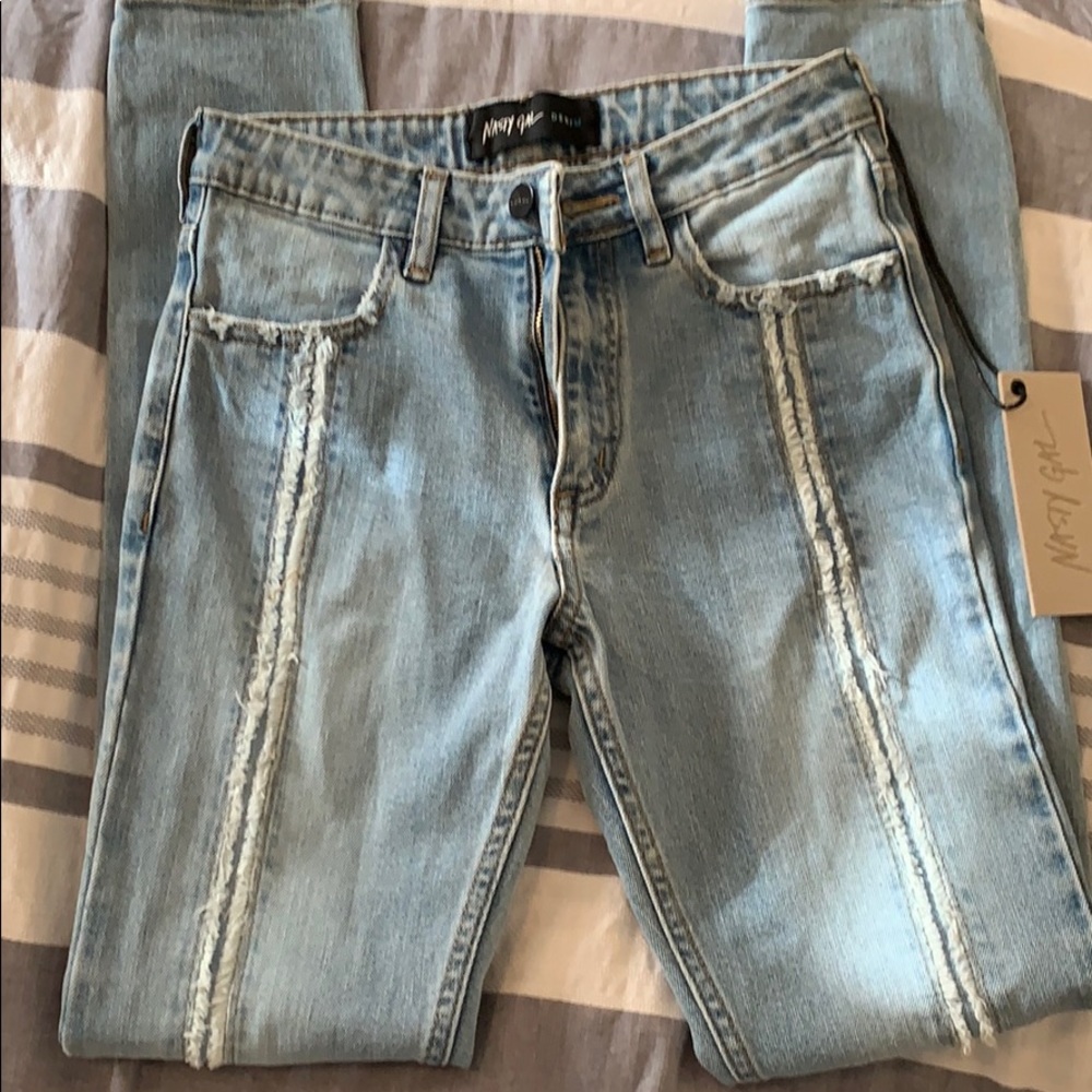 Skinny jeans with distressed stripes